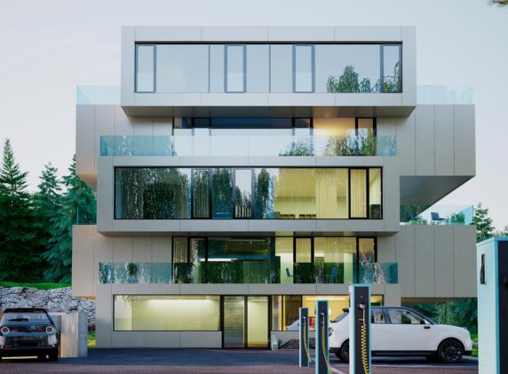 Modern apartment building with multiple floors, large glass windows, balconies, and electric vehicle charging stations